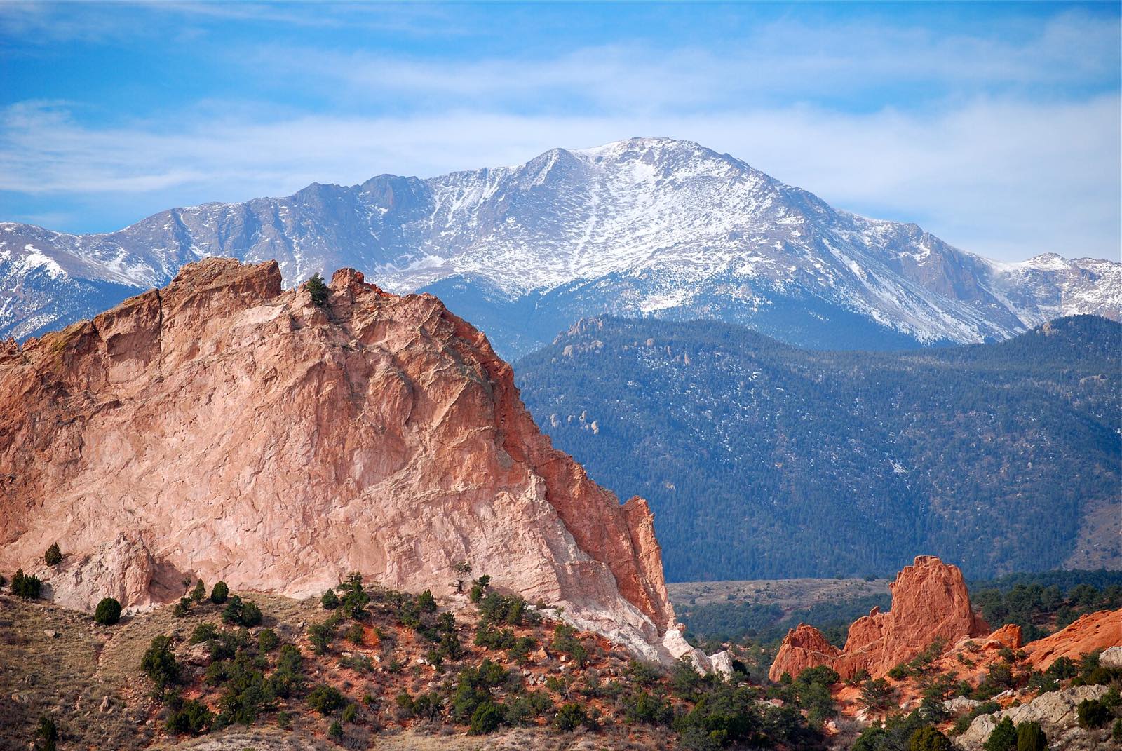 Pikes Peak rising behind the red rocks of Garden of the Gods